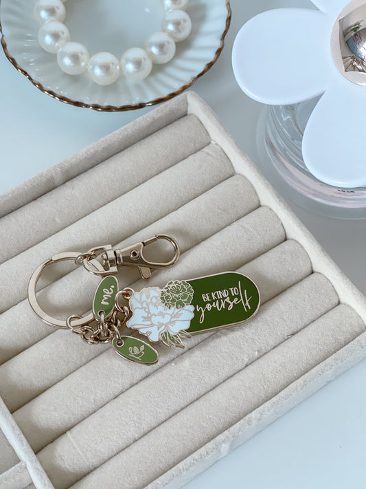 Empowering and positive keyrings with messages- Green Be Kind to Yourself Keyring with gold. Affordable and gorgeous