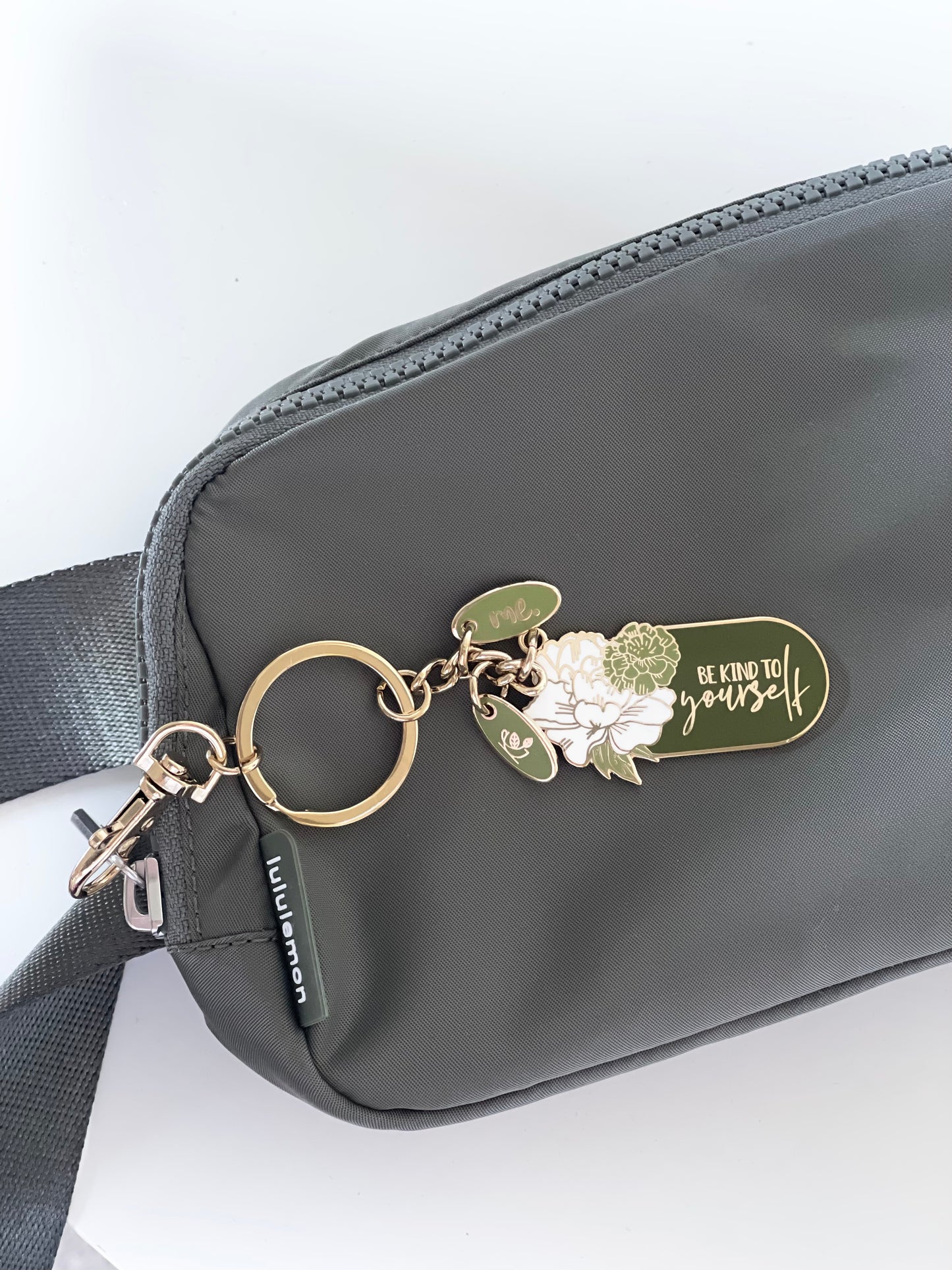 Empowering and positive keyrings with messages- Green Be Kind to Yourself Keyring with gold. Affordable and gorgeous
