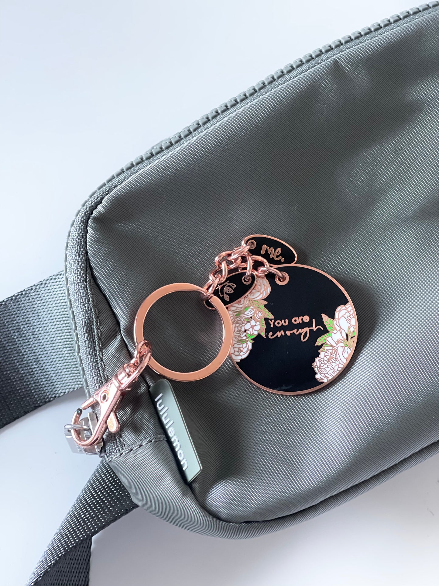 Black and Rose Gold You are Enough Circular Keyring. Trendy pretty accessory