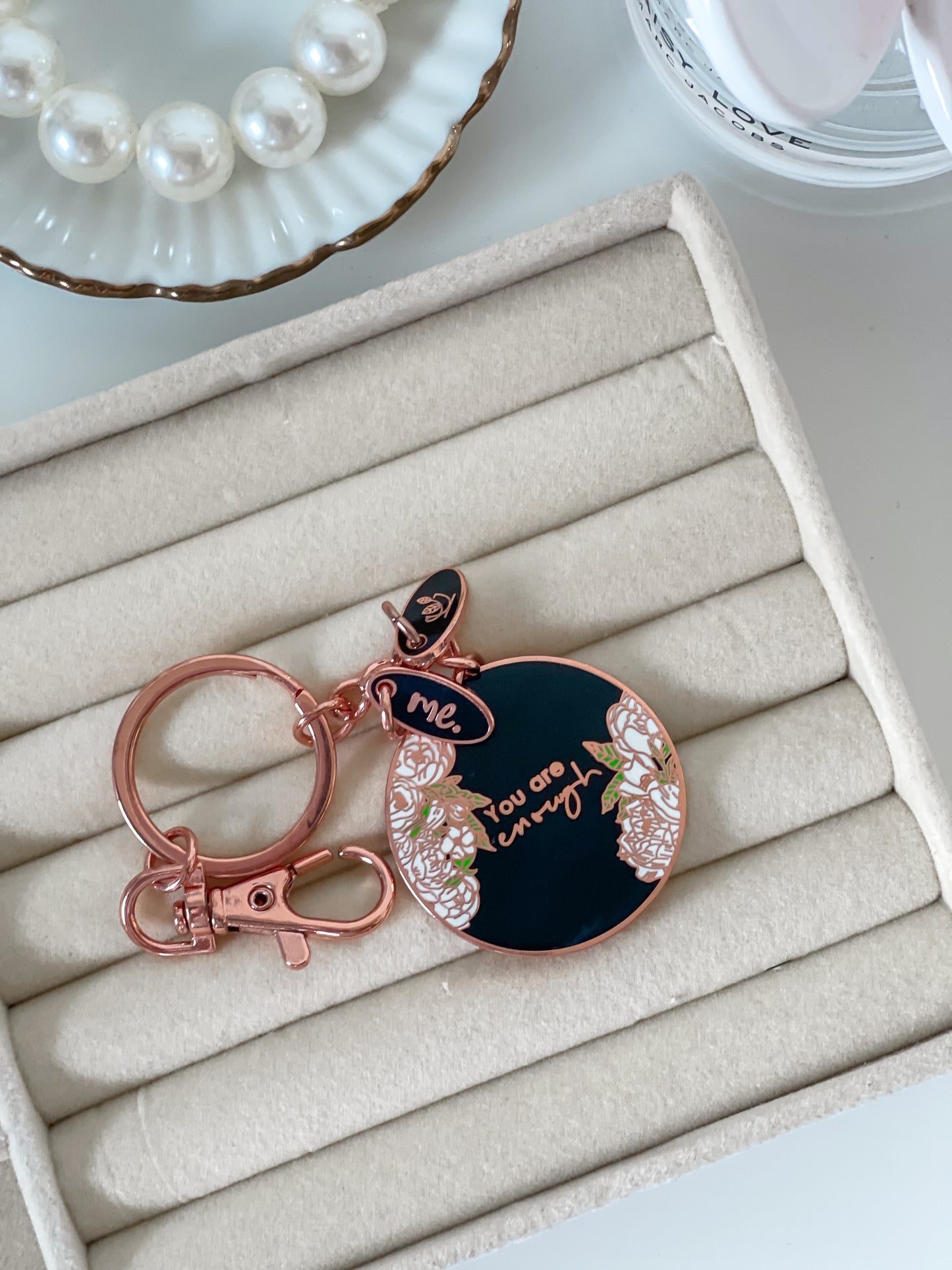 Black and Rose Gold You are Enough Circular Keyring. Trendy pretty accessory